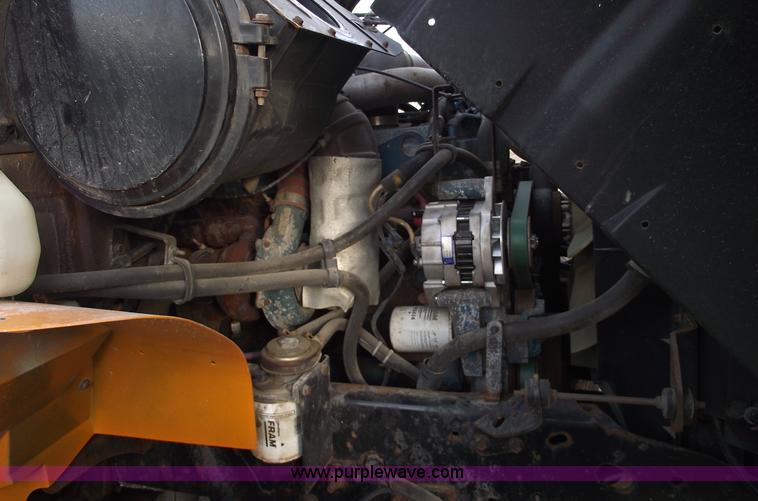 image for item C5819 2000 International 4900 dump truck with plow and spreader