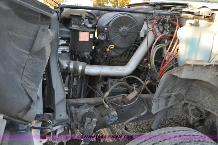 image for item A5717 1993 Ford F800 flatbed truck with tank