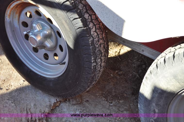 image for item A5720 2004 Wells Cargo RF7142 enclosed trailer with Rhino Liner mobile system