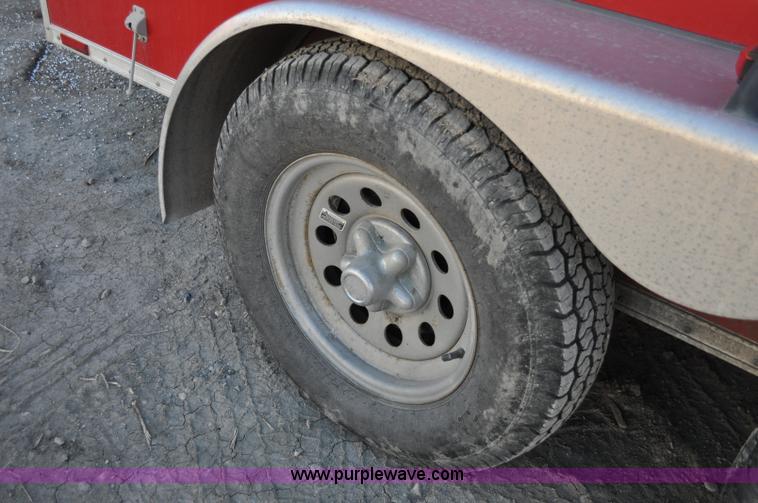 image for item A5720 2004 Wells Cargo RF7142 enclosed trailer with Rhino Liner mobile system