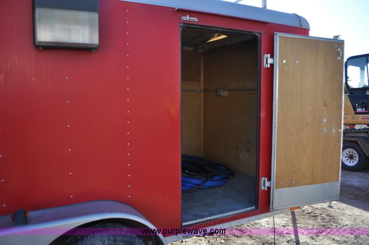 image for item A5720 2004 Wells Cargo RF7142 enclosed trailer with Rhino Liner mobile system