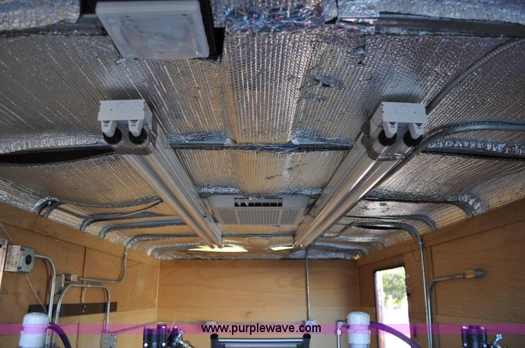 image for item A5720 2004 Wells Cargo RF7142 enclosed trailer with Rhino Liner mobile system