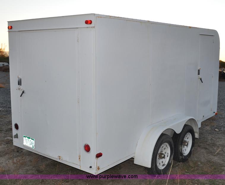 image for item A5735 2001 Justin C tandem axle trailer