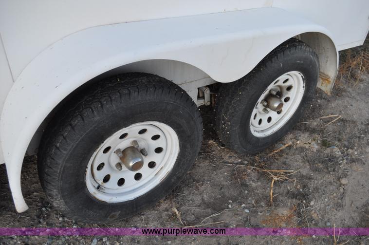 image for item A5735 2001 Justin C tandem axle trailer