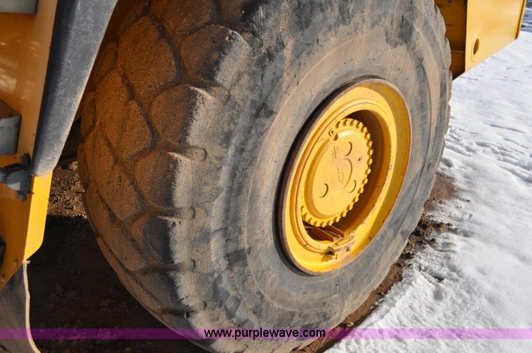 image for item A5747 2002 John Deere 350D 6x6 articulating dump truck