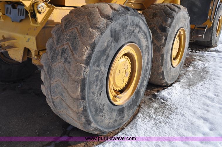 image for item A5747 2002 John Deere 350D 6x6 articulating dump truck