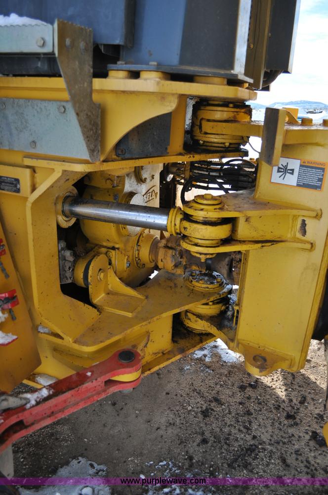 image for item A5747 2002 John Deere 350D 6x6 articulating dump truck