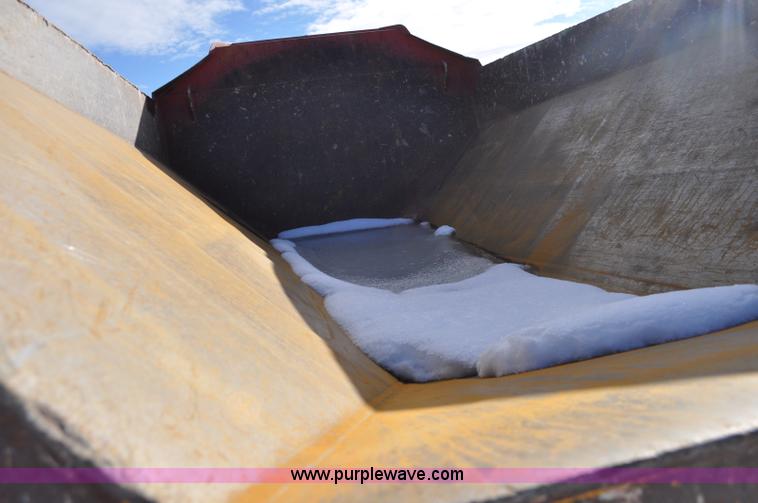 image for item A5747 2002 John Deere 350D 6x6 articulating dump truck