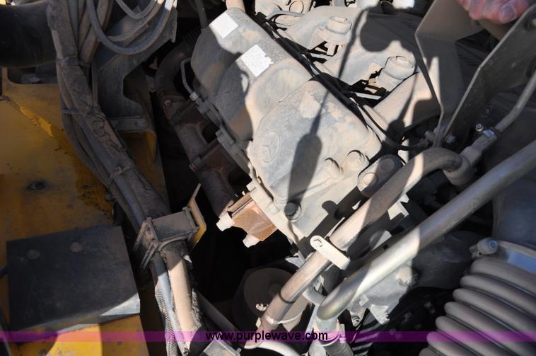 image for item A5747 2002 John Deere 350D 6x6 articulating dump truck