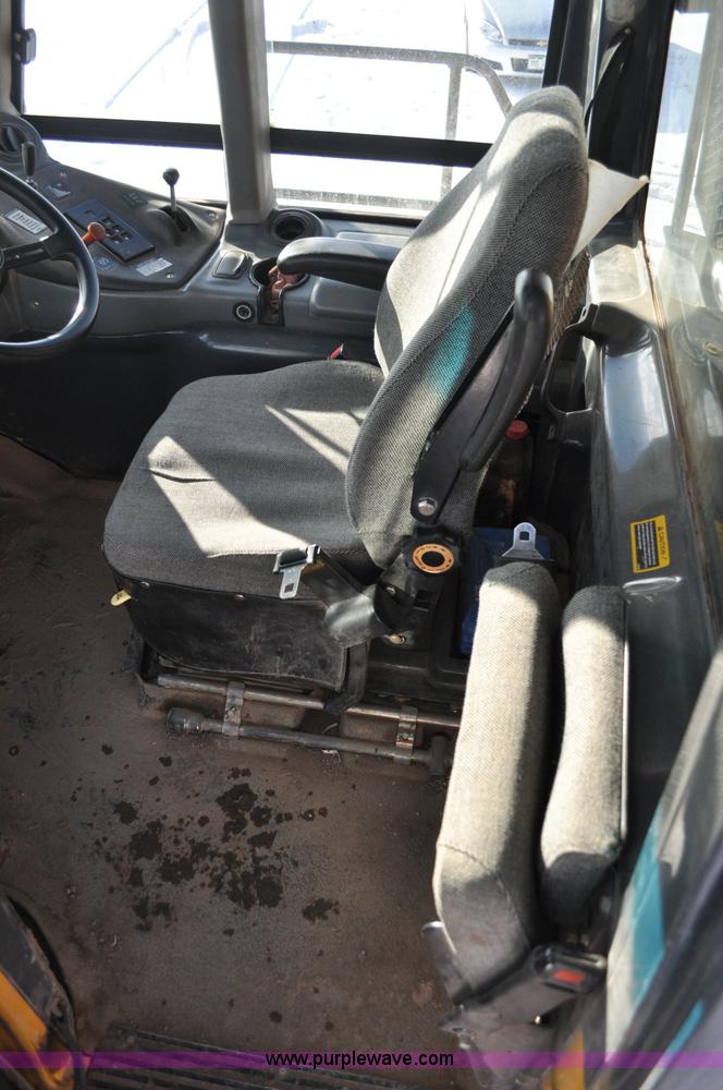 image for item A5747 2002 John Deere 350D 6x6 articulating dump truck