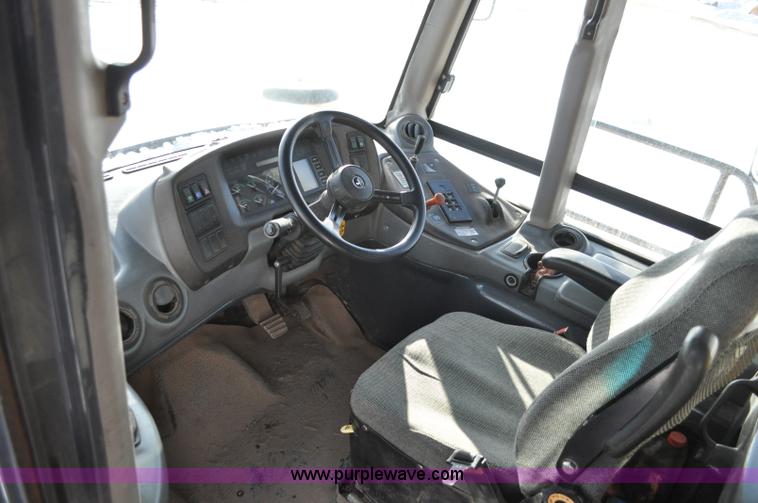 image for item A5747 2002 John Deere 350D 6x6 articulating dump truck