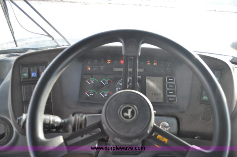 image for item A5747 2002 John Deere 350D 6x6 articulating dump truck