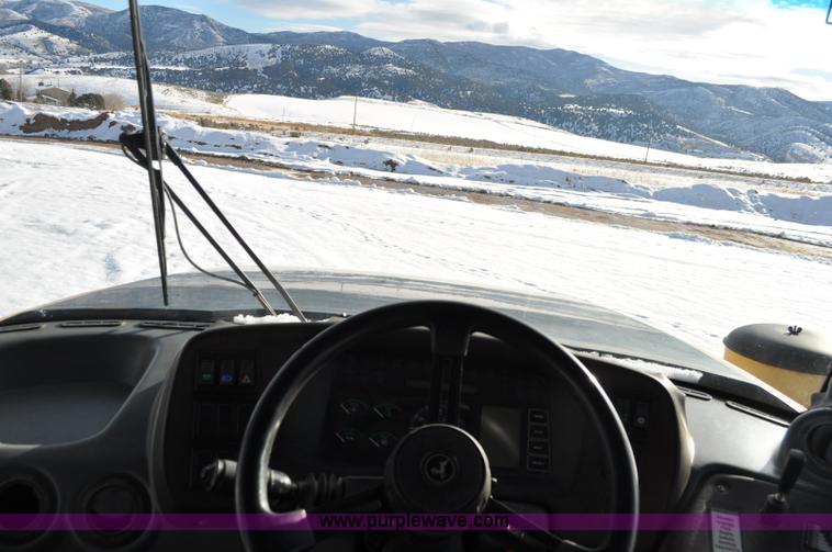 image for item A5747 2002 John Deere 350D 6x6 articulating dump truck