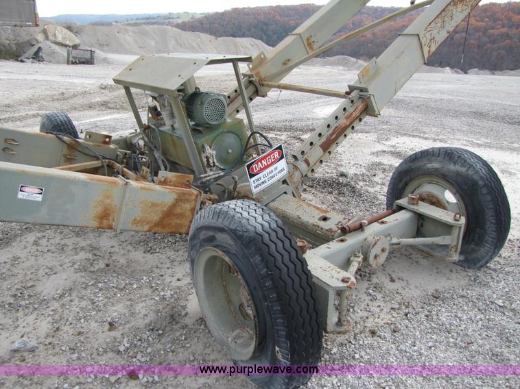 image for item B2036 1995 Marco 30" x 120' portable radial stacking conveyor