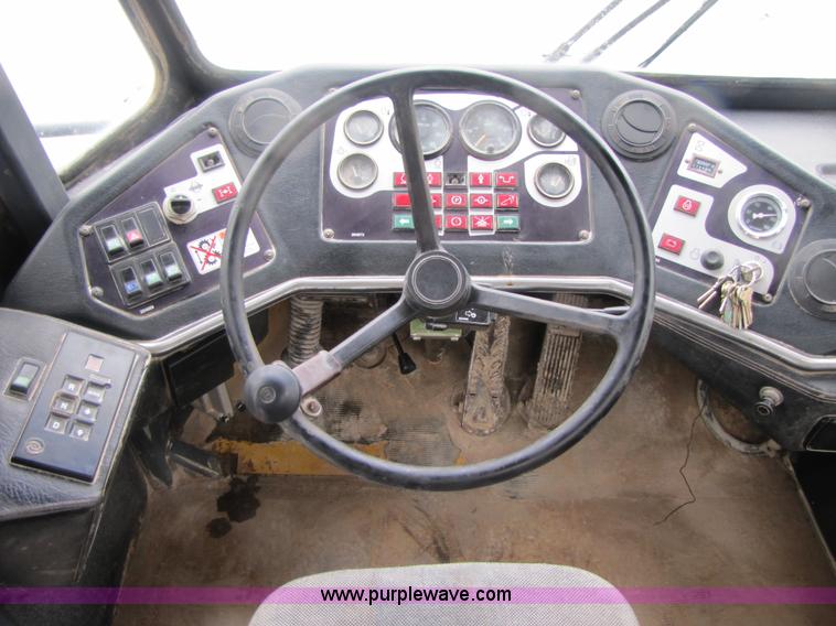 image for item B2110 2000 John Deere 350C 6x6 articulating dump truck