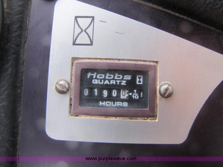 image for item B2110 2000 John Deere 350C 6x6 articulating dump truck