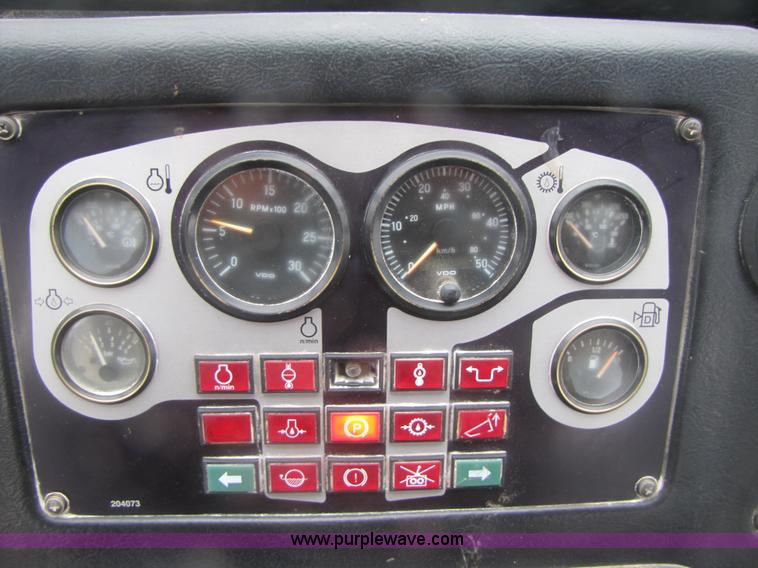 image for item B2110 2000 John Deere 350C 6x6 articulating dump truck