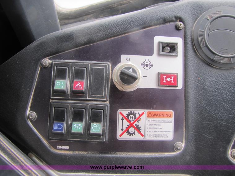 image for item B2110 2000 John Deere 350C 6x6 articulating dump truck