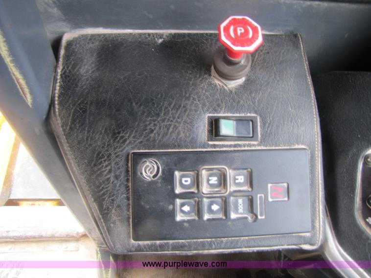 image for item B2110 2000 John Deere 350C 6x6 articulating dump truck