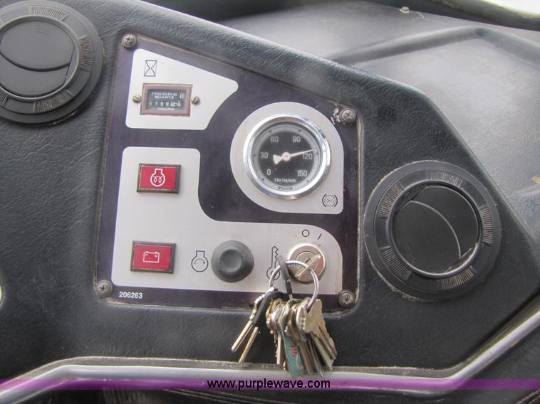 image for item B2110 2000 John Deere 350C 6x6 articulating dump truck