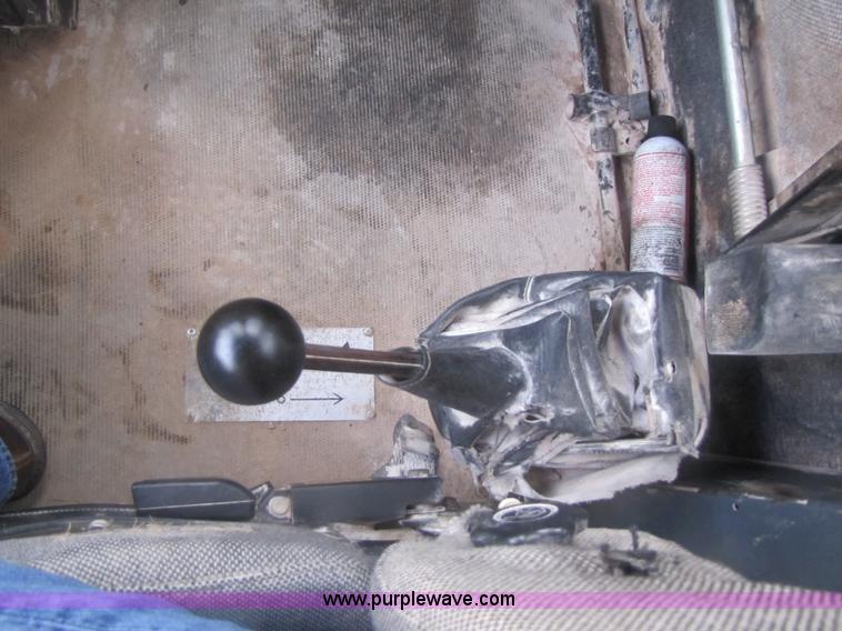 image for item B2110 2000 John Deere 350C 6x6 articulating dump truck