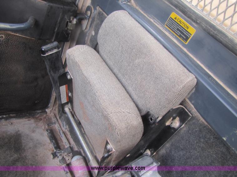 image for item B2110 2000 John Deere 350C 6x6 articulating dump truck