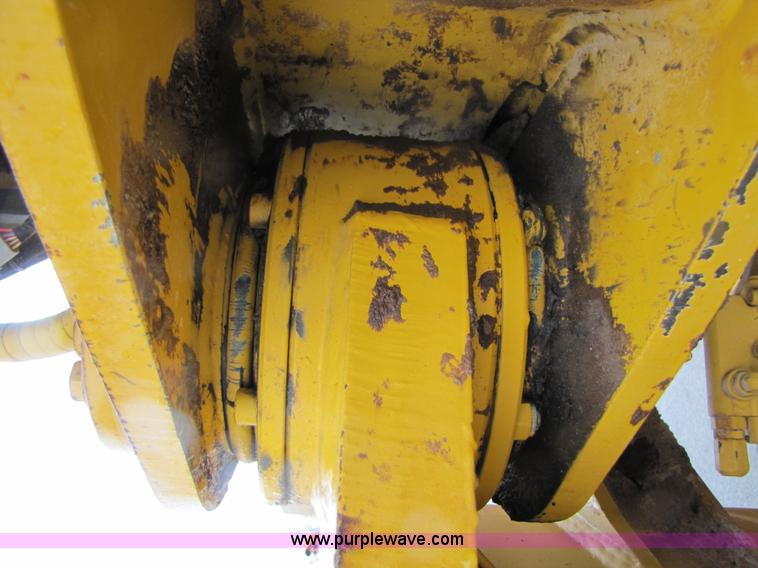 image for item B2110 2000 John Deere 350C 6x6 articulating dump truck