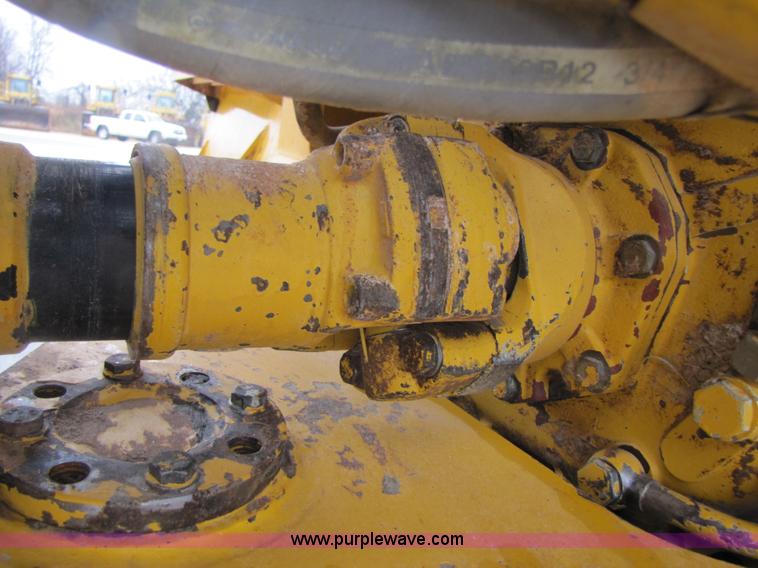 image for item B2110 2000 John Deere 350C 6x6 articulating dump truck