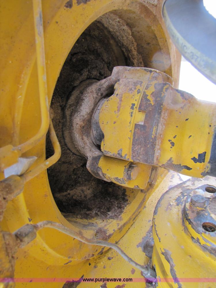 image for item B2110 2000 John Deere 350C 6x6 articulating dump truck