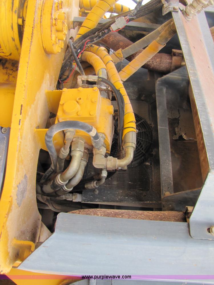 image for item B2110 2000 John Deere 350C 6x6 articulating dump truck