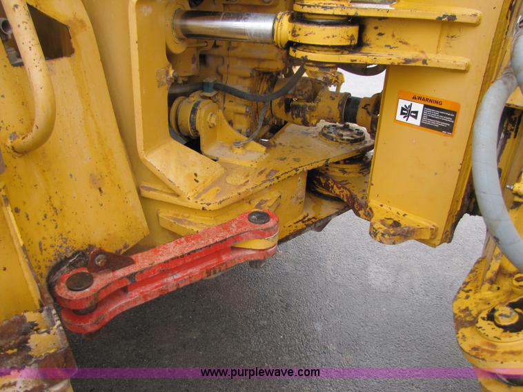 image for item B2110 2000 John Deere 350C 6x6 articulating dump truck