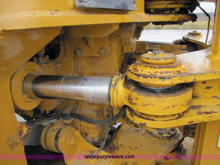 image for item B2110 2000 John Deere 350C 6x6 articulating dump truck