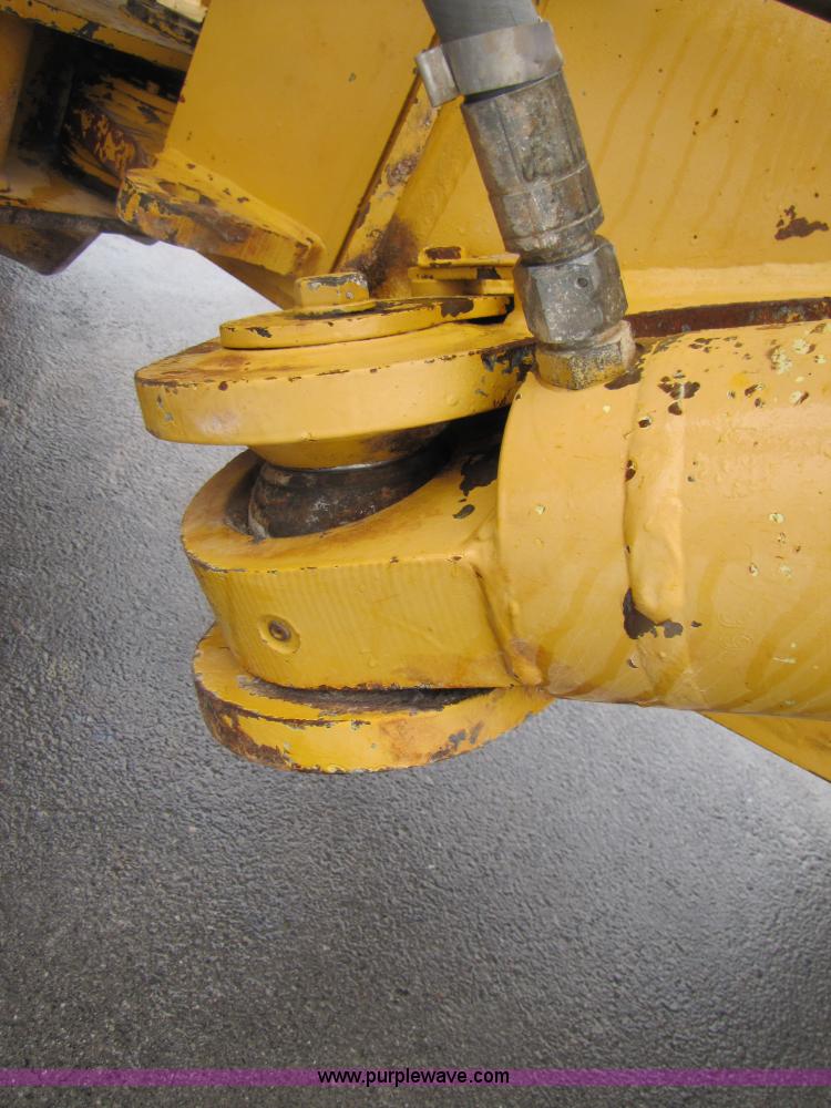 image for item B2110 2000 John Deere 350C 6x6 articulating dump truck