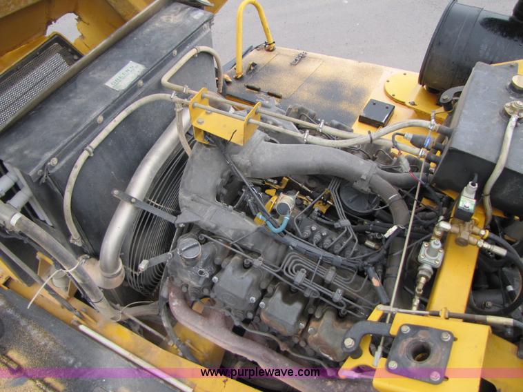 image for item B2110 2000 John Deere 350C 6x6 articulating dump truck