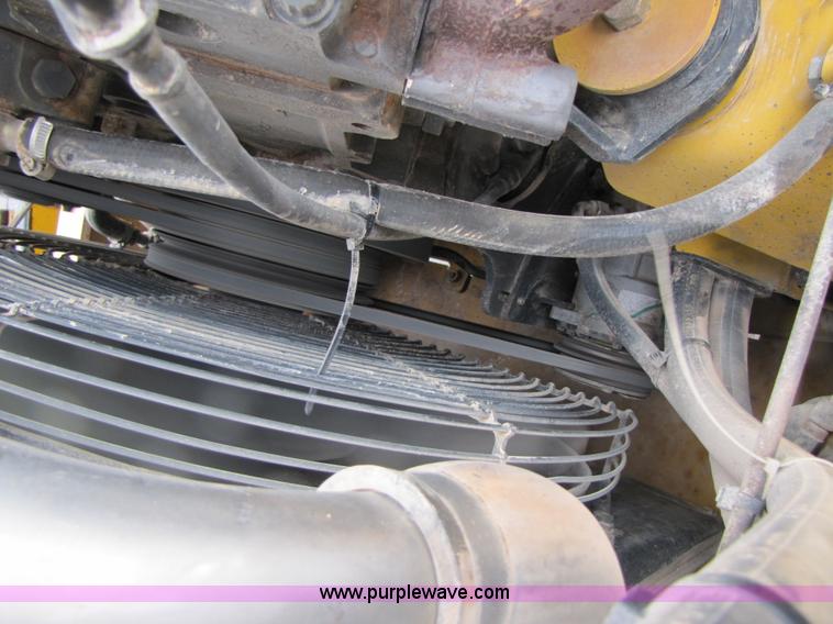 image for item B2110 2000 John Deere 350C 6x6 articulating dump truck