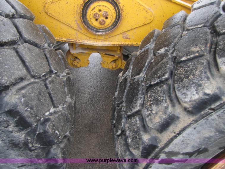 image for item B2110 2000 John Deere 350C 6x6 articulating dump truck