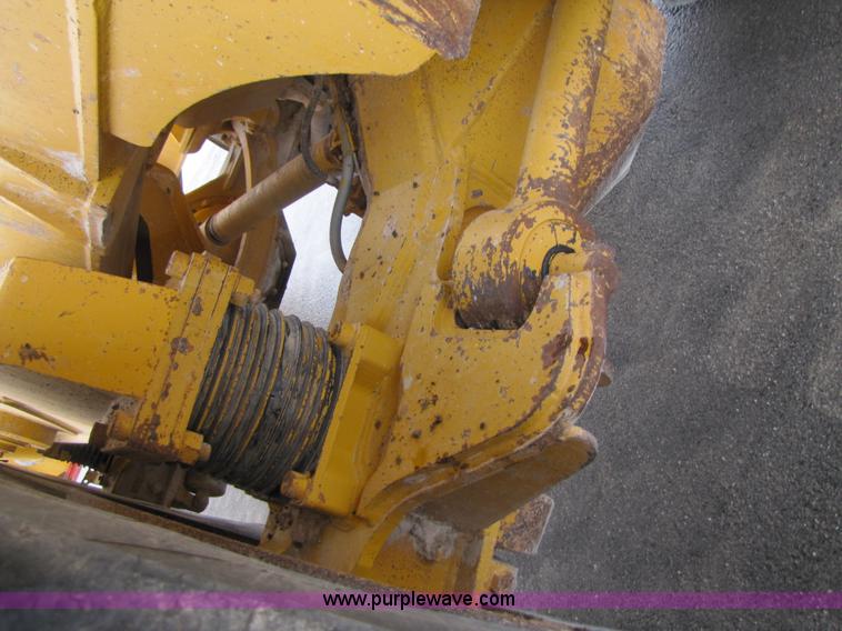 image for item B2110 2000 John Deere 350C 6x6 articulating dump truck