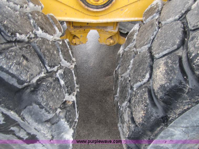 image for item B2110 2000 John Deere 350C 6x6 articulating dump truck