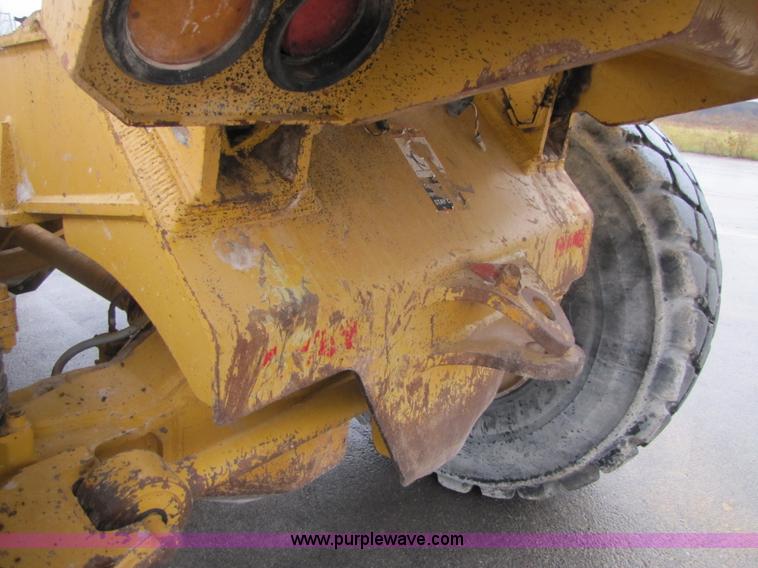 image for item B2110 2000 John Deere 350C 6x6 articulating dump truck