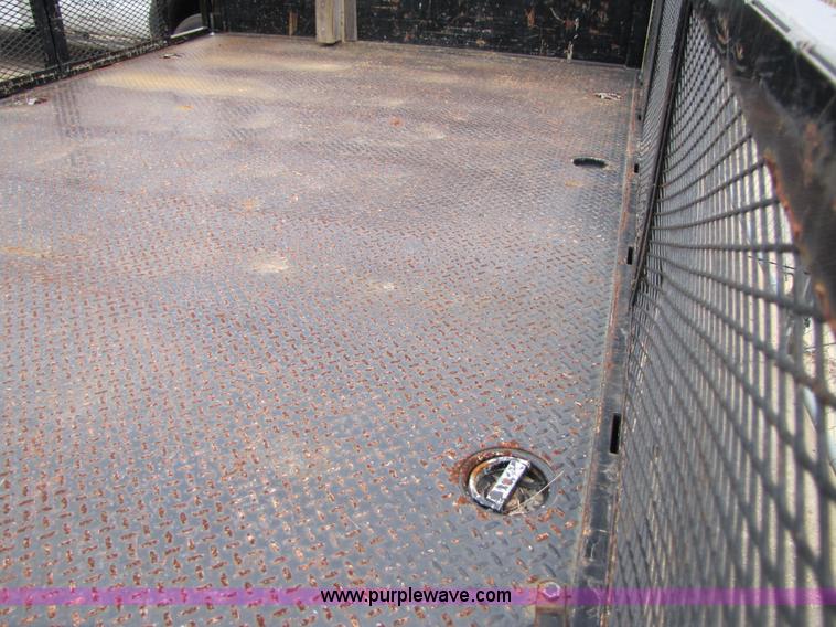 image for item B2149 2007 Ford F450 Super Duty flatbed delivery truck