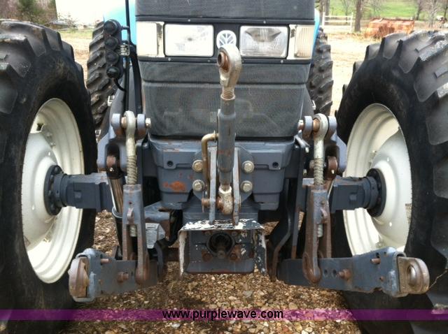 image for item A1718 1998 New Holland TV140 bi-directional 4WD tractor