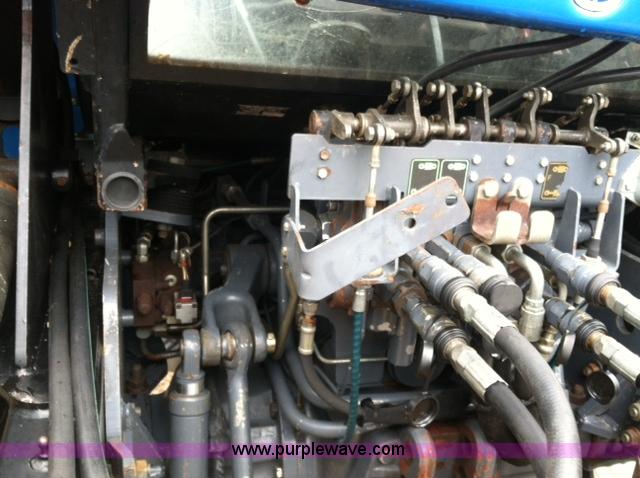 image for item A1718 1998 New Holland TV140 bi-directional 4WD tractor