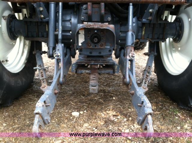 image for item A1718 1998 New Holland TV140 bi-directional 4WD tractor