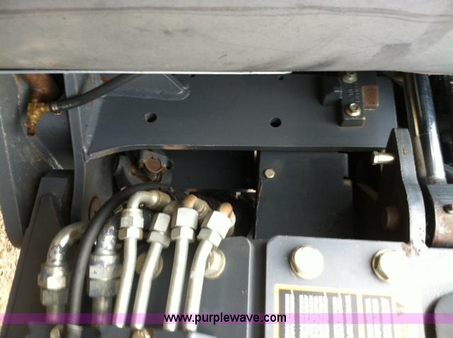 image for item A1718 1998 New Holland TV140 bi-directional 4WD tractor