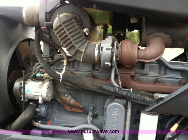 image for item A1718 1998 New Holland TV140 bi-directional 4WD tractor