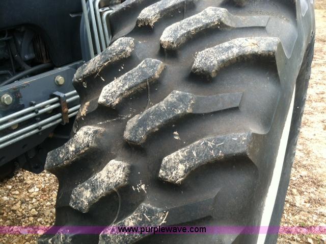 image for item A1718 1998 New Holland TV140 bi-directional 4WD tractor