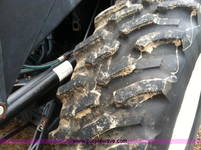 image for item A1718 1998 New Holland TV140 bi-directional 4WD tractor