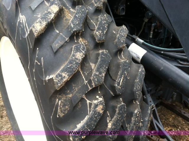 image for item A1718 1998 New Holland TV140 bi-directional 4WD tractor