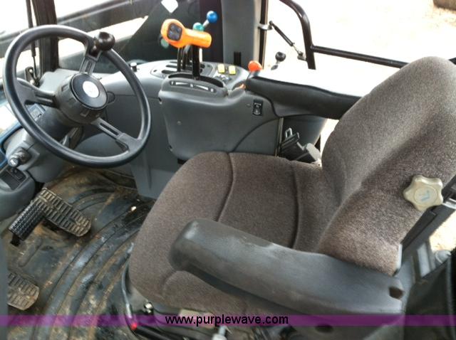 image for item A1718 1998 New Holland TV140 bi-directional 4WD tractor