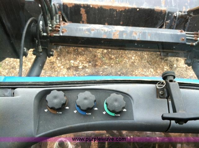 image for item A1718 1998 New Holland TV140 bi-directional 4WD tractor